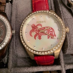 Fossil watch red leather band/bull design on face